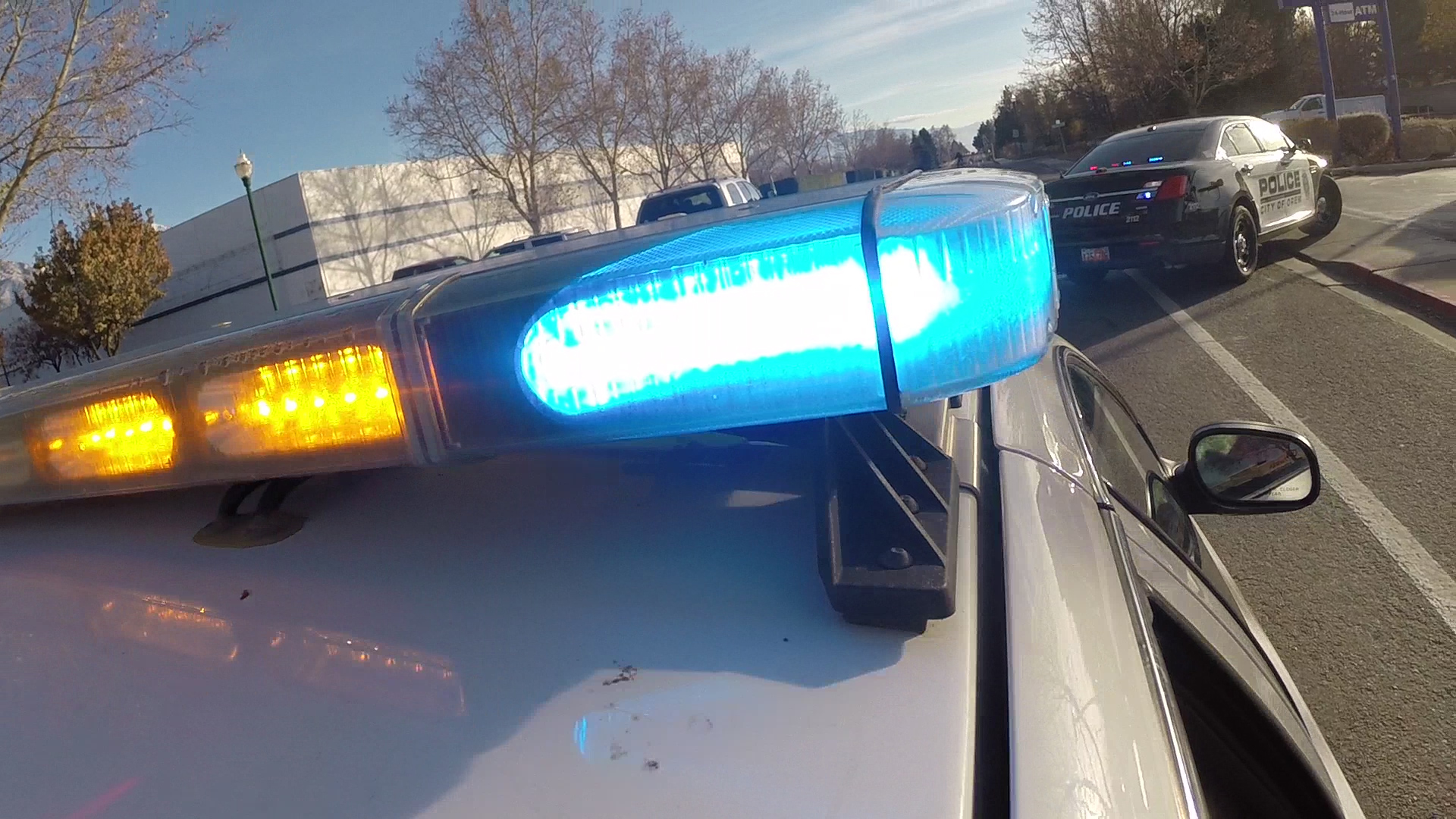Two people were arrested in Millard County following an unusual investigation that began after golf balls with derogatory messages on them were thrown into a yard. 