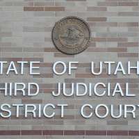 Charges filed against driver accused of shooting at armed bystanders following crash