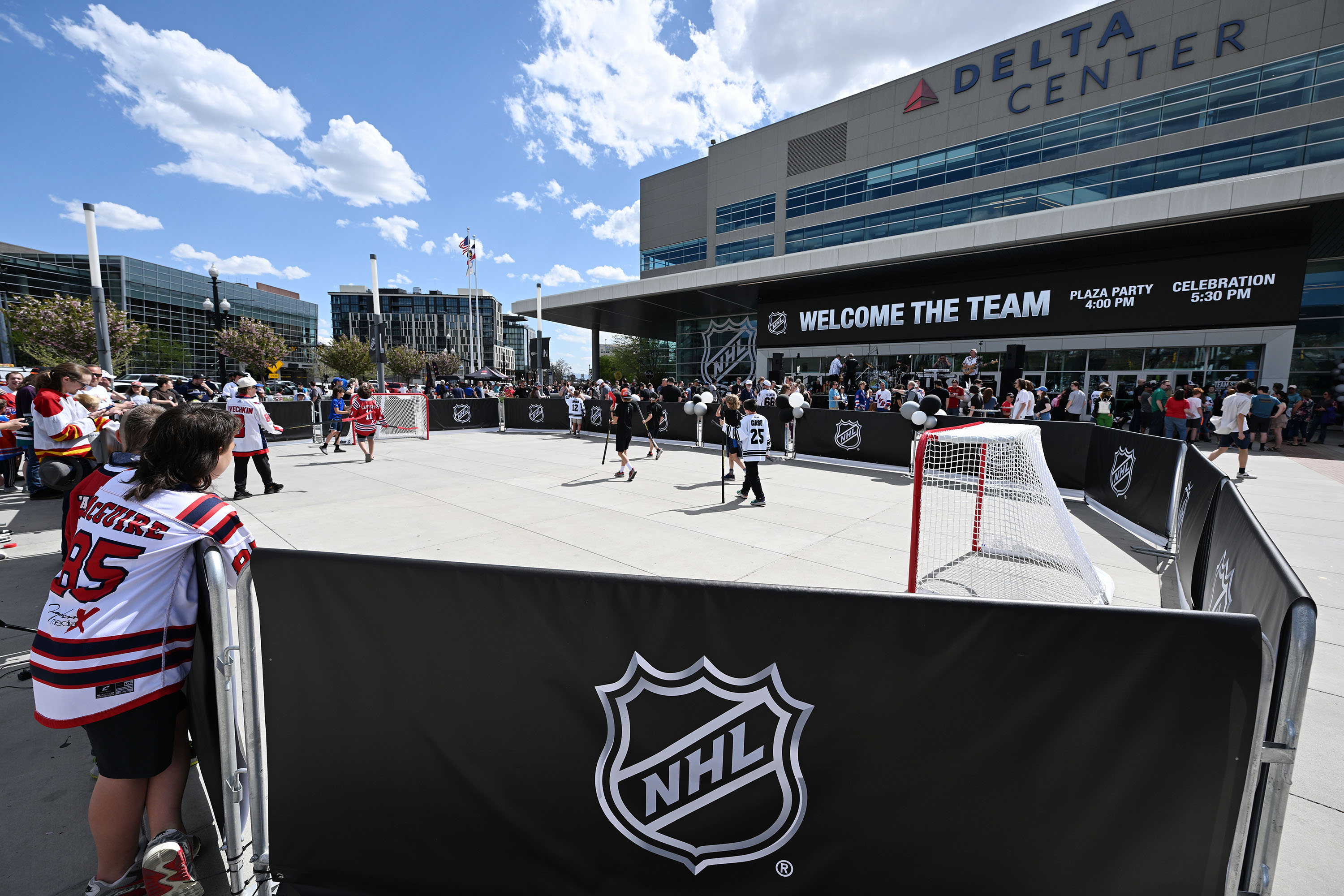 Kids play street hockey ahead of the doors opening as thousands attend the NHL event at the Delta Center in Salt Lake City on April 24. KSL obtained the document Smith Entertainment Group filed to Salt Lake City for a proposed revitalization district, which outlines its intent to remain at the arena and focus on improvements around it.