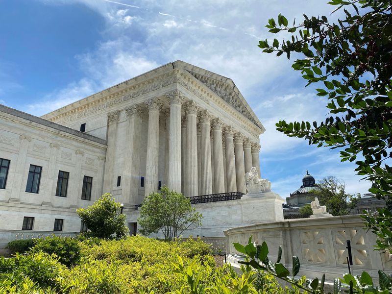 The Supreme Court on Friday temporarily paused judicial orders requiring the Department of Government Efficiency to turn over records and answer questions in the coming days and weeks concerning its operations.